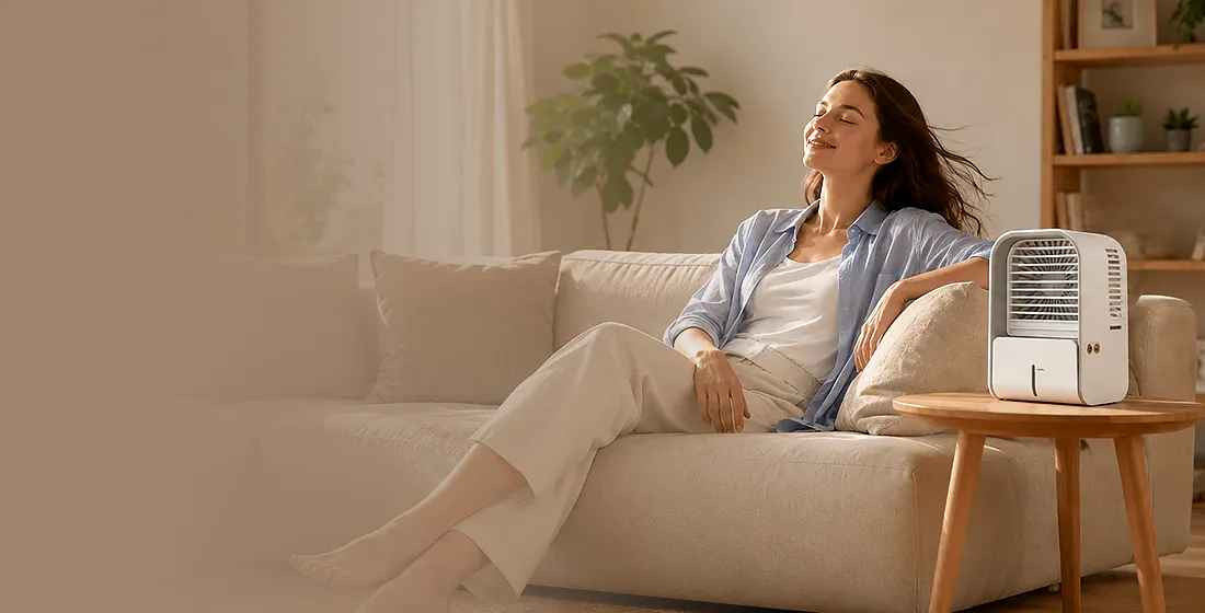 Woman relaxing at home near her Frostcooler, header banner for the Terms and Conditions page